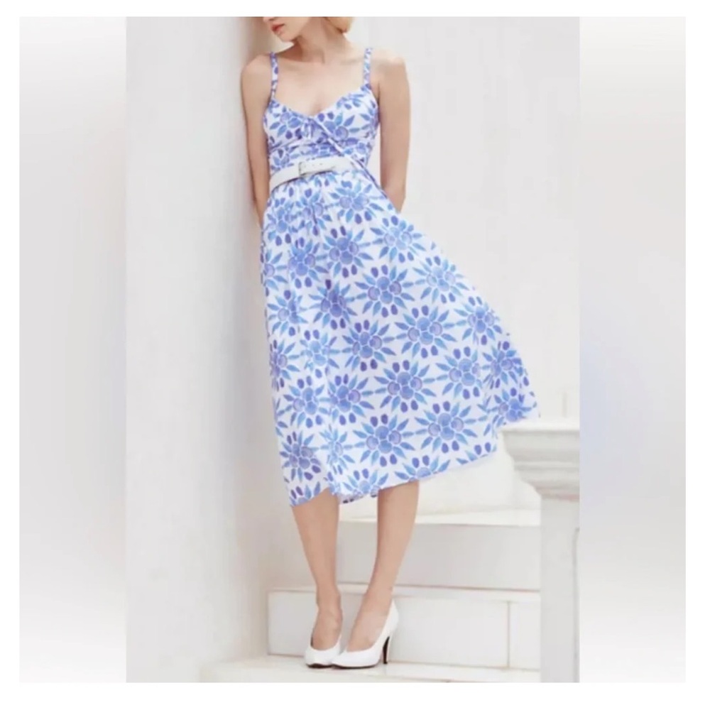 White Maxi Dress with Blue Floral Print and Adjustable Straps